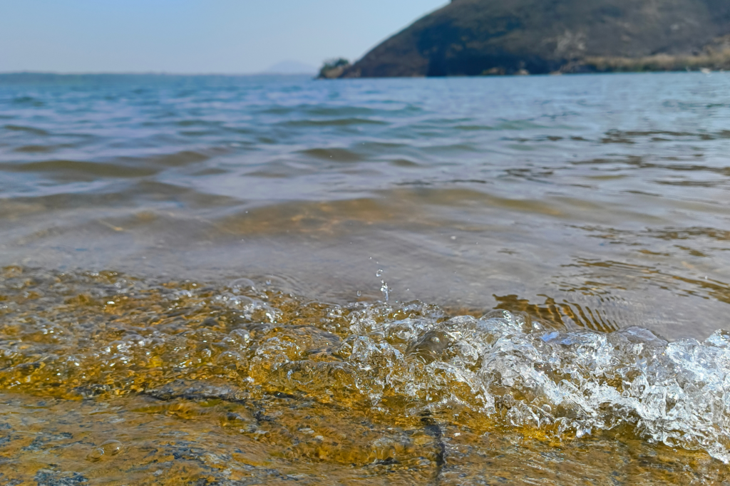 Mydala Lake, shore, waves, soil, sky, water